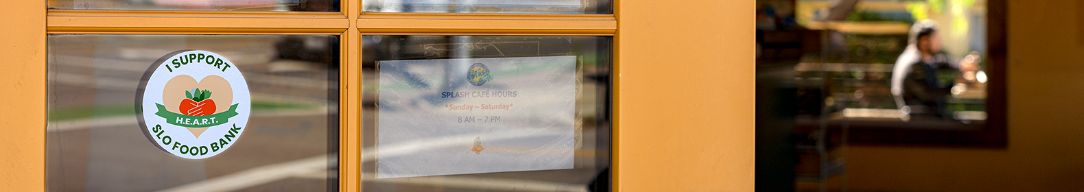 A window displays a sticker supporting SLO Food Bank.